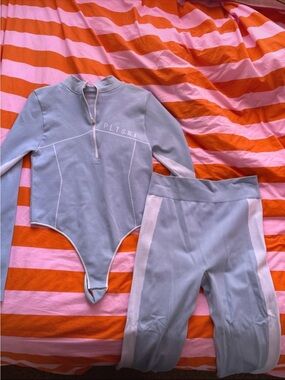 PrettyLittleThing Light Blue Long Sleeve Bodysuit & Cycling Shorts Set